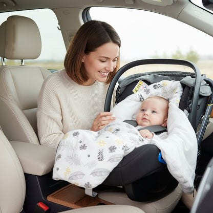 Nid d'ange bebe feuille bebe qui dans son siege dans la voiture avec mama