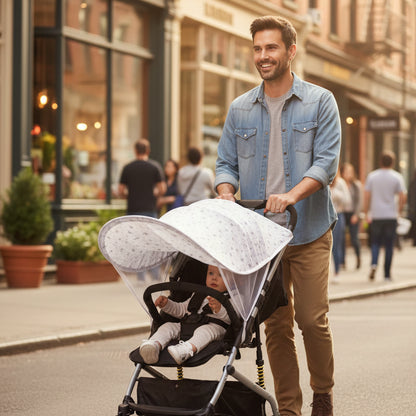 Pare soleil poussette étoile, papa dans la rue avec son enfant protègé du soleil