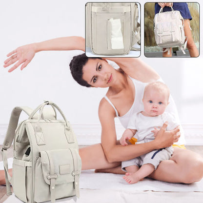 Sac à dos à langer beige maman fait le yoga avec son bébé à main