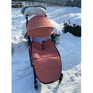 Chanceliere poussette rose, poussette dans la neige 