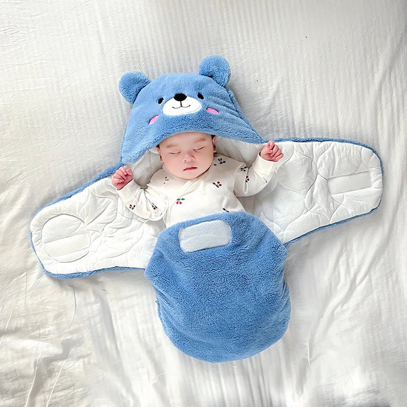 nid d'ange bébé bleu, bebe couché dans le lit