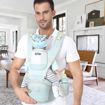 Porte bebe vert, papa porte bébé endormi face à face 