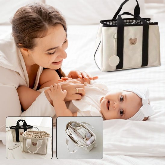 Sac à langer blanc noir près de maman et bébé