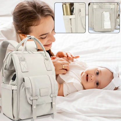 sac à dos à langer beige multipoches