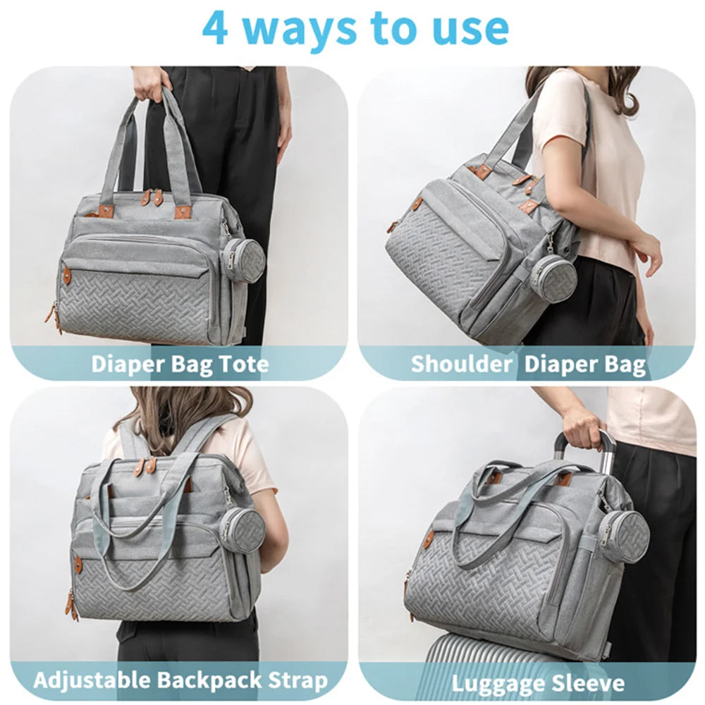 sac  à langer bébé gris porté de différentes manières